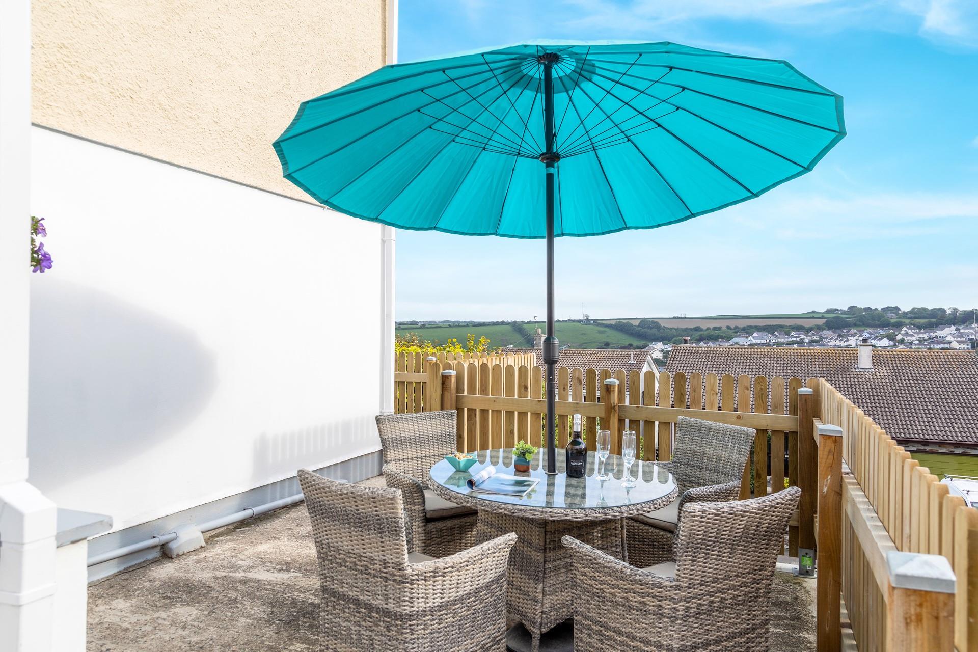 Get stuck into a good book with views of the village in the background.