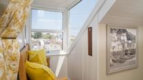 Grab a good book and settle into the window seat looking out to sea.