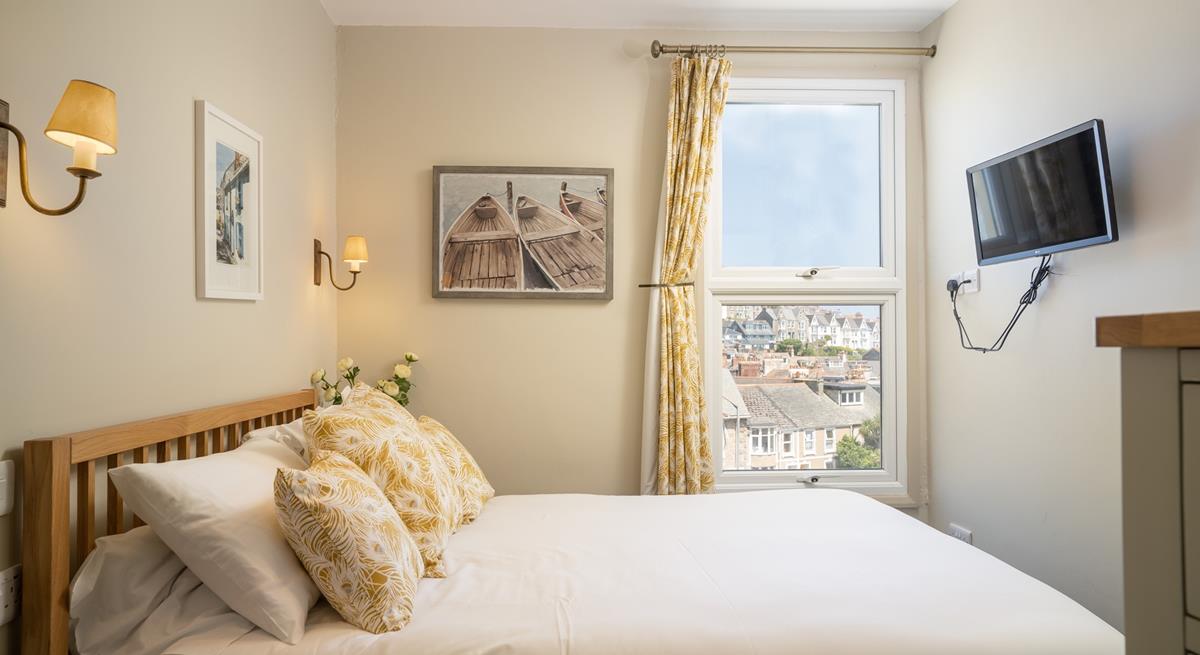 Exhausted from a day in the sun, real in bed and drift off to sleep in your cosy double bed.