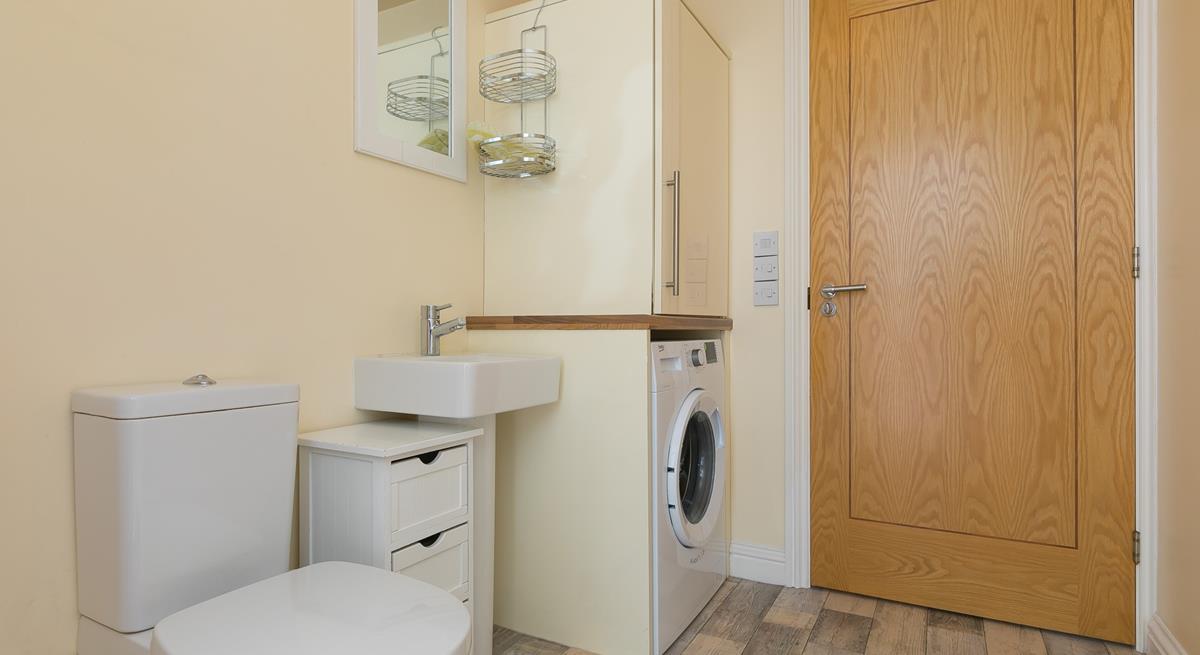 You don't need to worry about sandy clothes, there is a washing machine in the utility room.