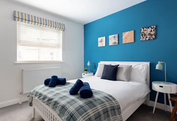 Tuck into your cosy double bed after a day of exploring the coast path.