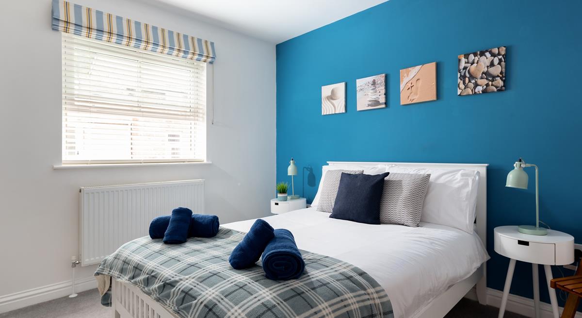 Tuck into your cosy double bed after a day of exploring the coast path.