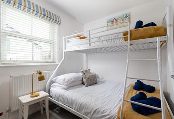 Bedroom 2 has triple bunk beds- perfect for a kid's sleepover!