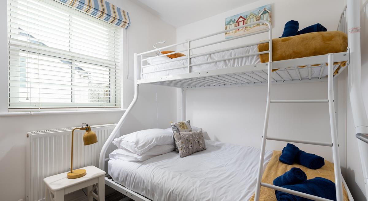 Bedroom 2 has triple bunk beds- perfect for a kid's sleepover!