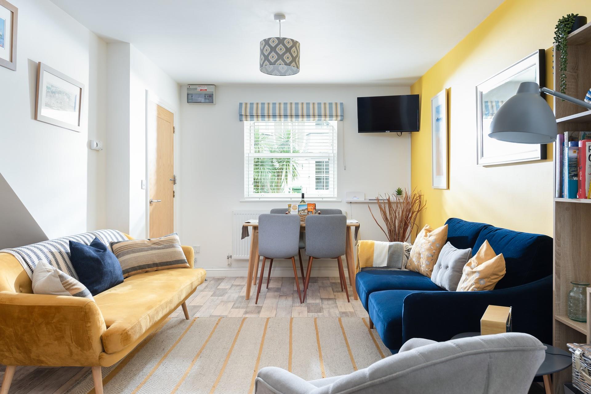 The open plan living area is a bright space for the family to relax.