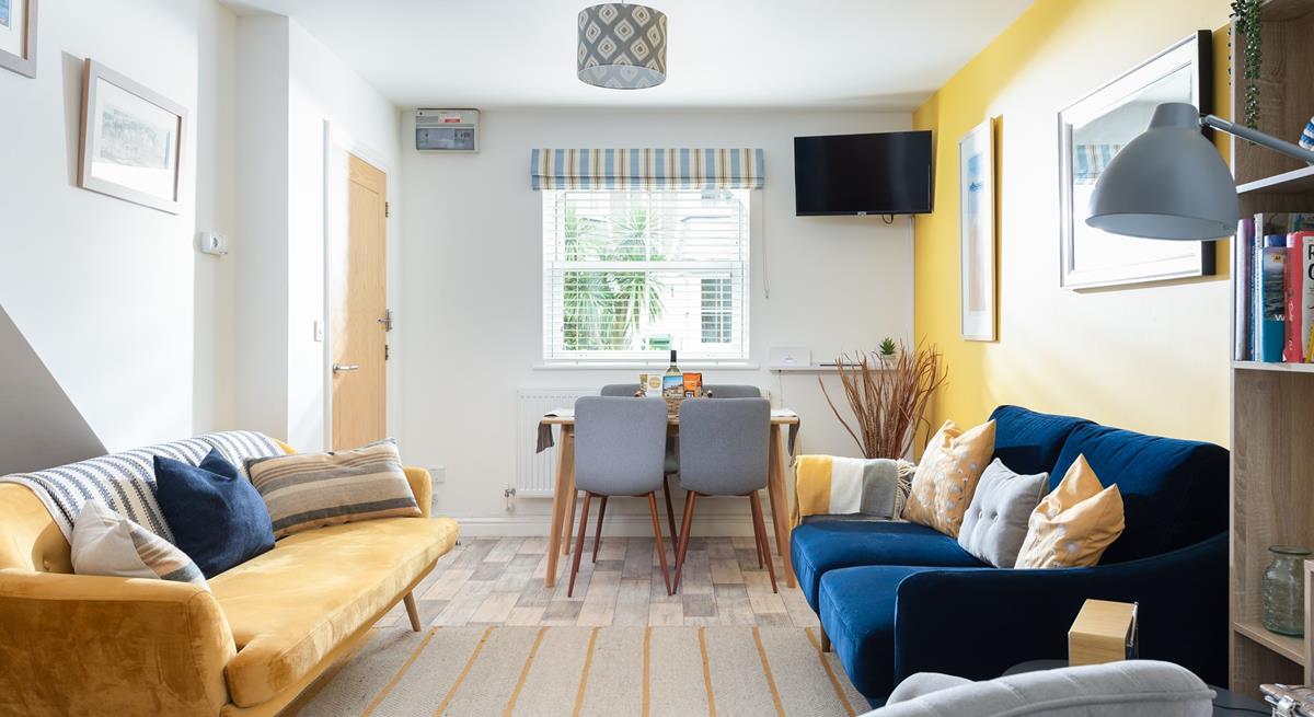 The open plan living area is a bright space for the family to relax.