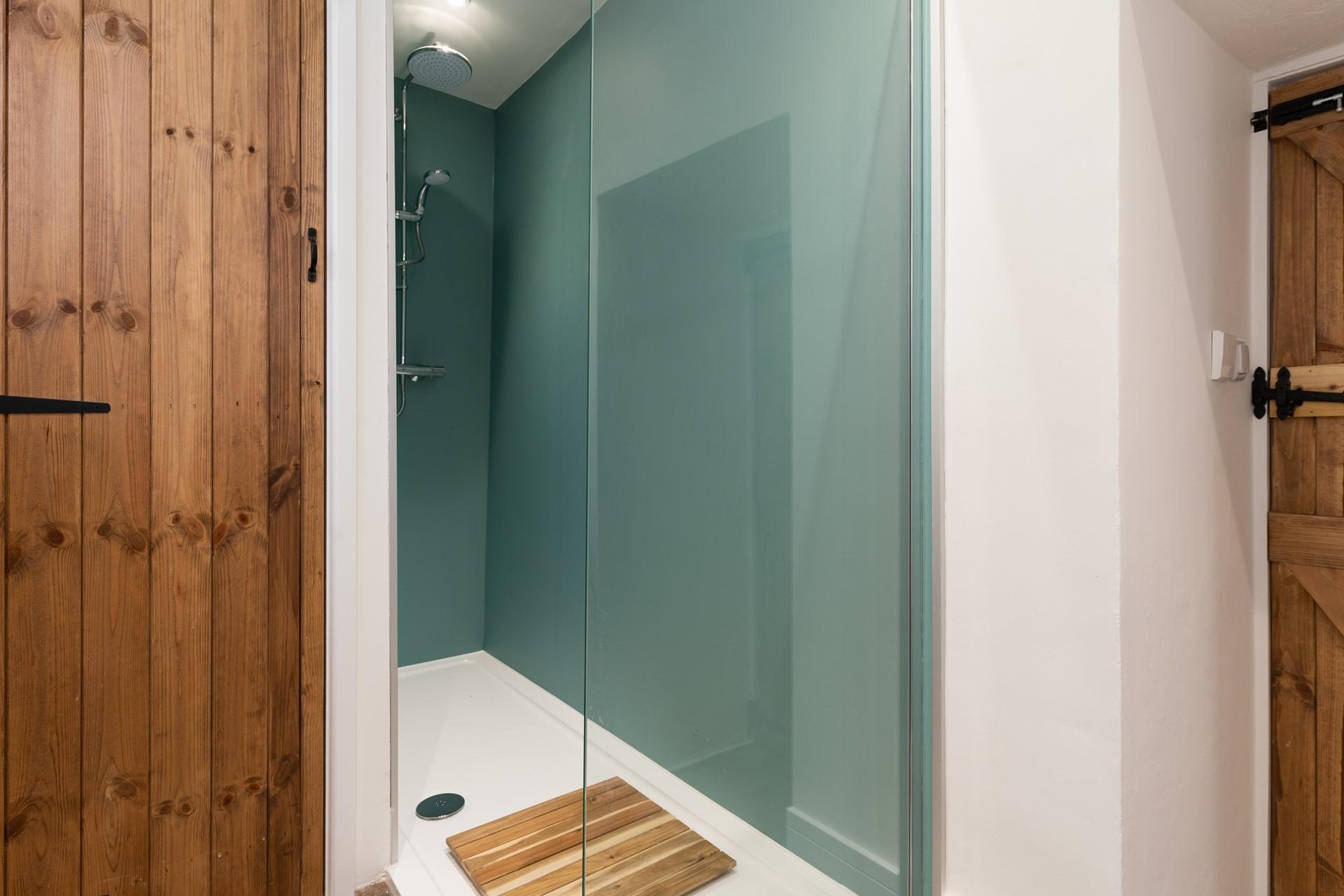 After spending the day at the beach come back to wash the sand off in your shower.