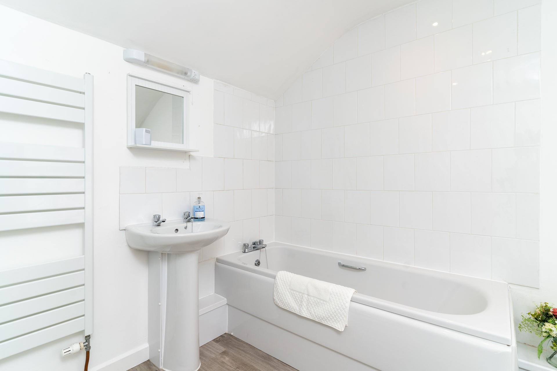 The family bathroom has everything you need to holiday by the sea, with ease.