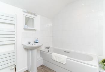 The family bathroom has everything you need to holiday by the sea, with ease.
