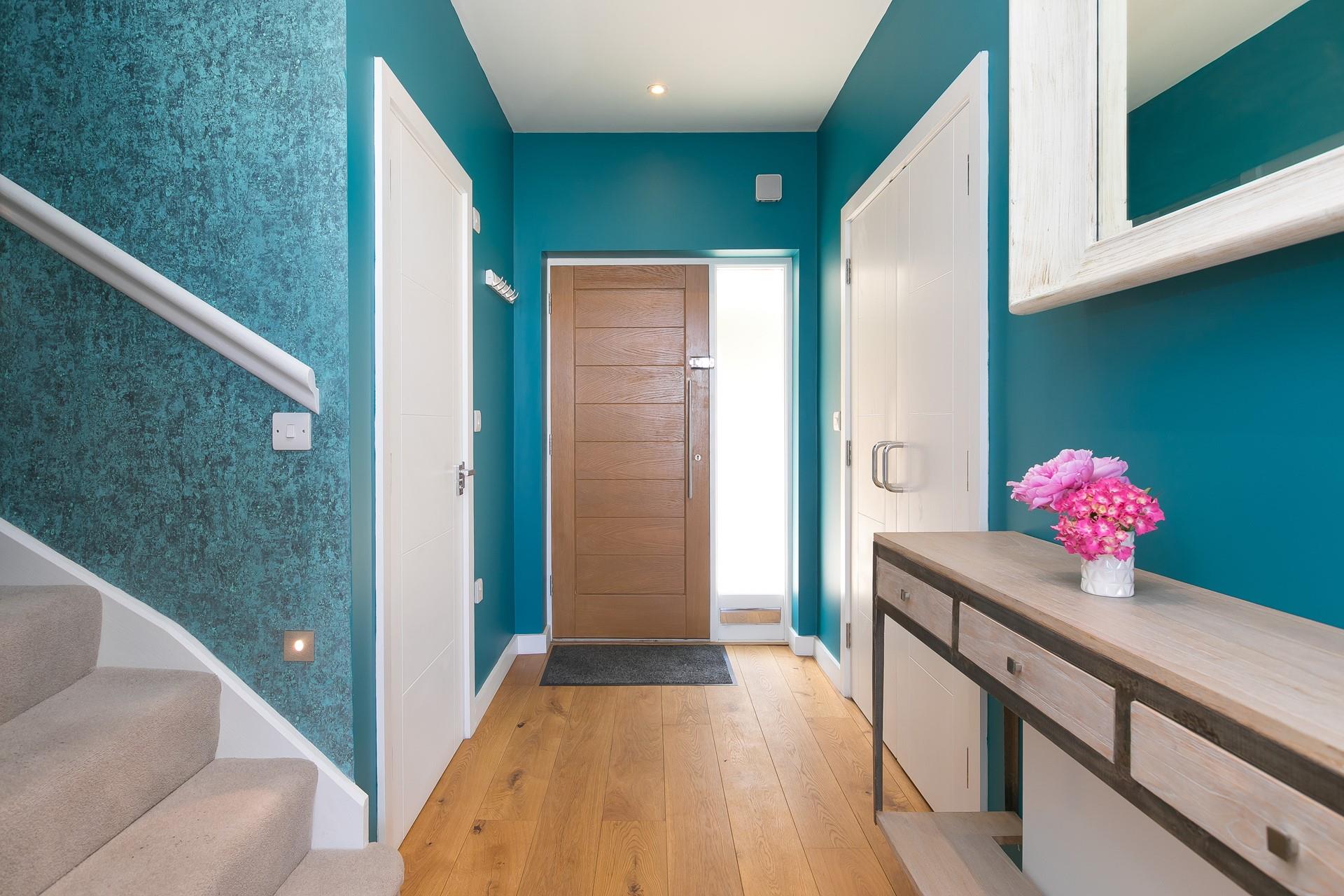 Splashes of colour create a stylish feel to this lovely home.