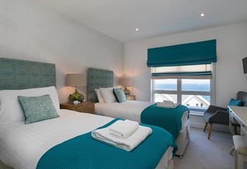 Bedroom 2 has twin beds and gorgeous sea views.