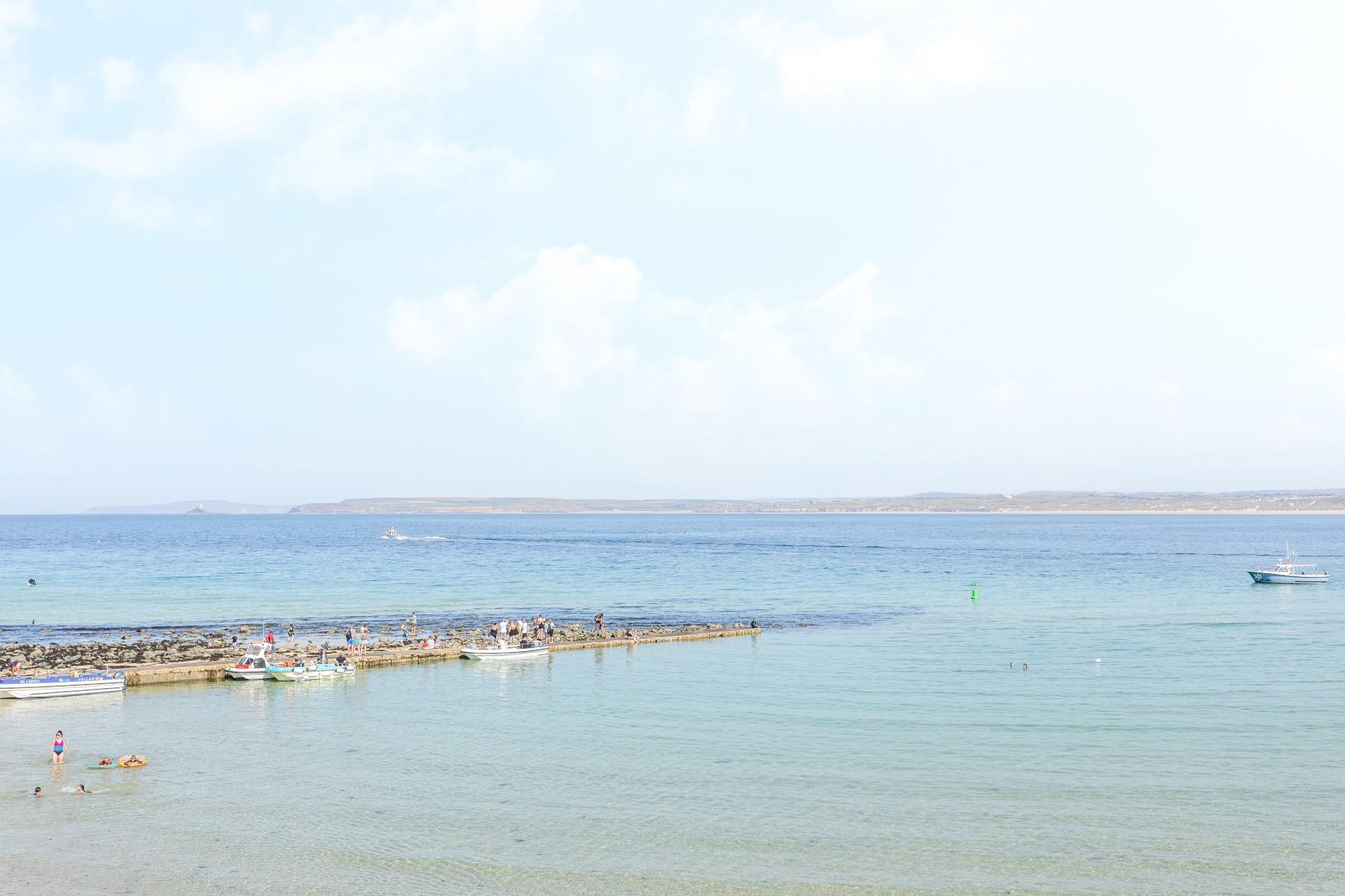 Swim in the turquoise waters and sunbathe on the soft sandy beach.