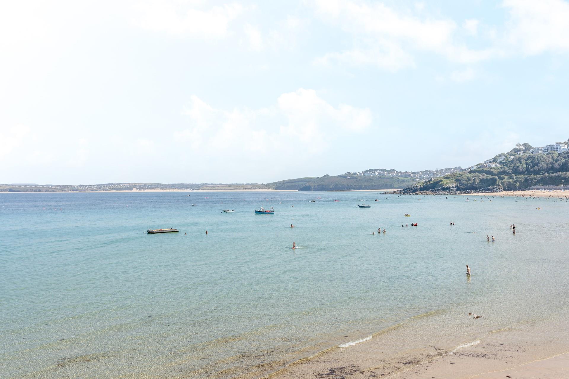 Sit on the beach and enjoy stunning views across St Ives Bay.