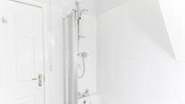 Start your day right with a shower and set yourself up for a day on a beautiful sandy beach.