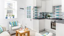 The open plan sitting/kitchen/dining area means you can spend time together as a family as you cook delicious meals.