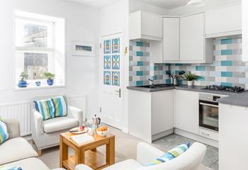 The open plan sitting/kitchen/dining area means you can spend time together as a family as you cook delicious meals.