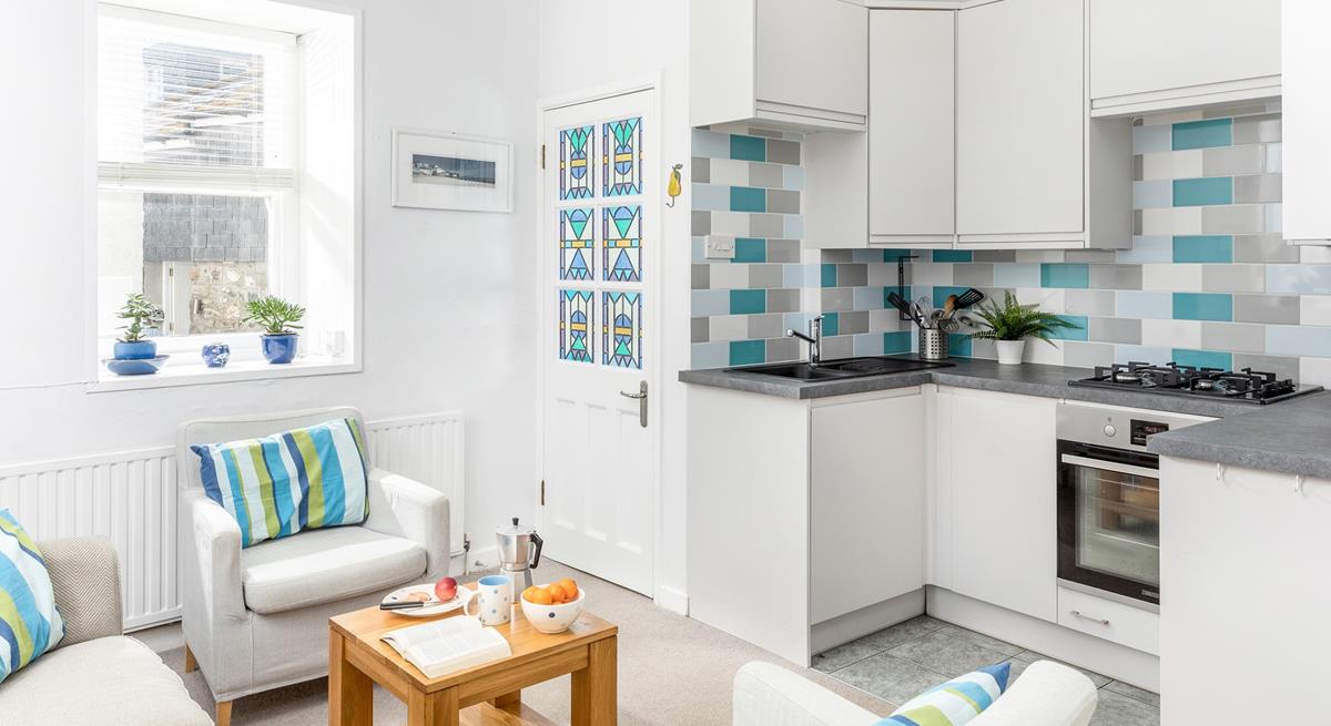 The open plan sitting/kitchen/dining area means you can spend time together as a family as you cook delicious meals.