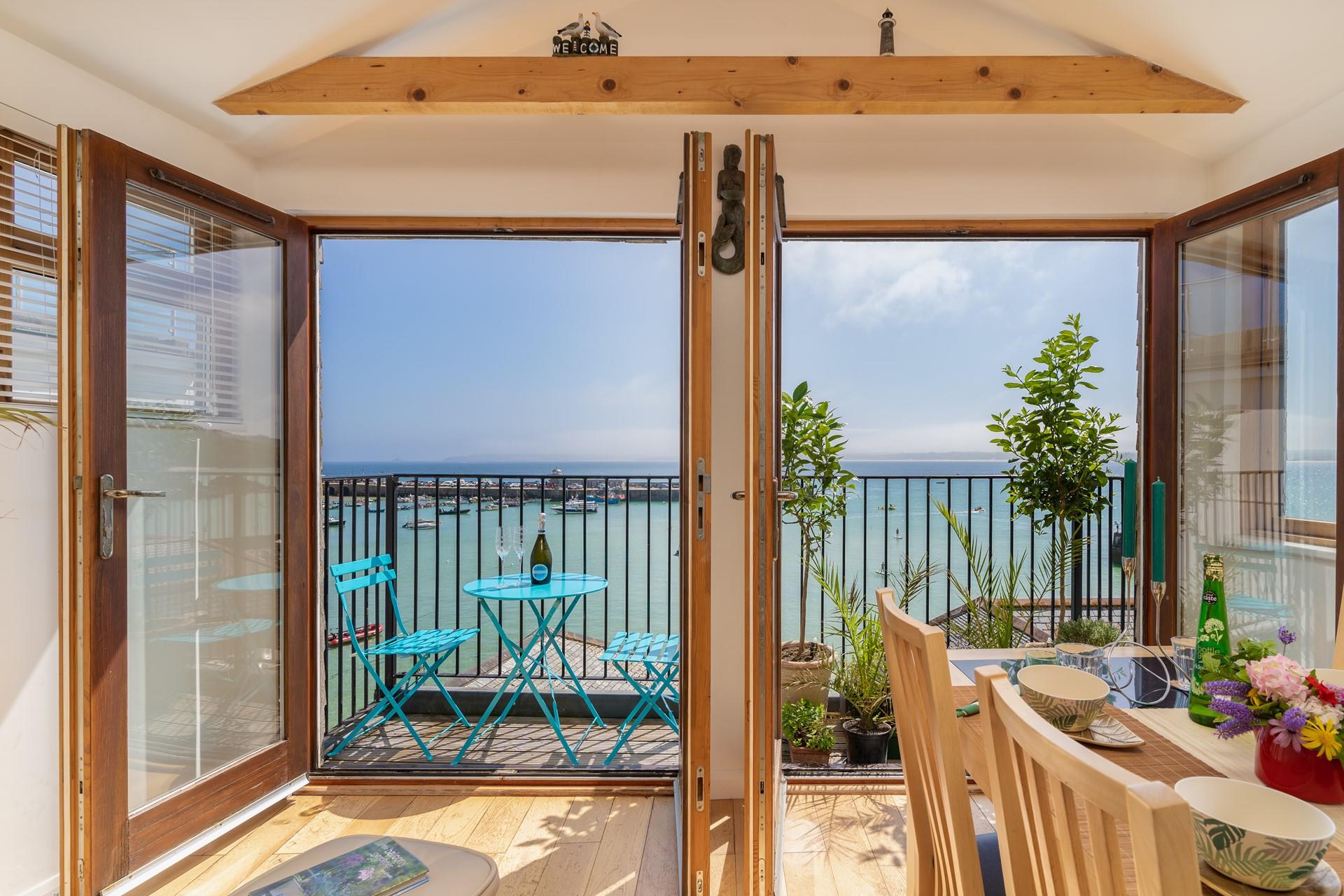 Spend the evening sitting on the balcony watching the world go by.