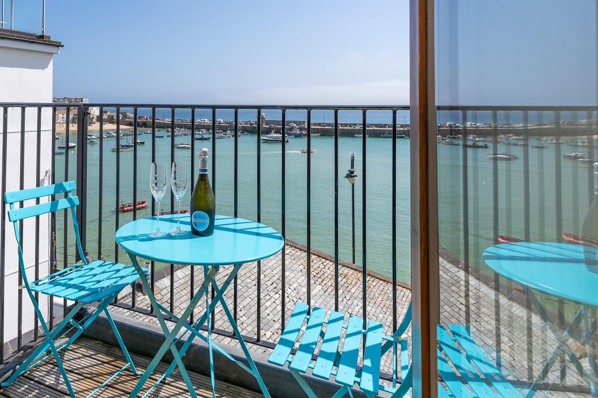 Open a bottle of wine to sip on the balcony on a sunny afternoon.
