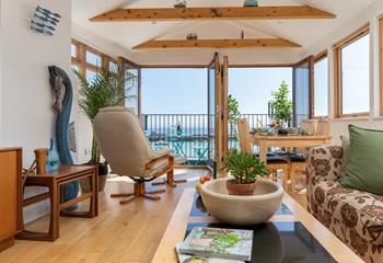 Open the patio doors and let the fresh sea air into the apartment.