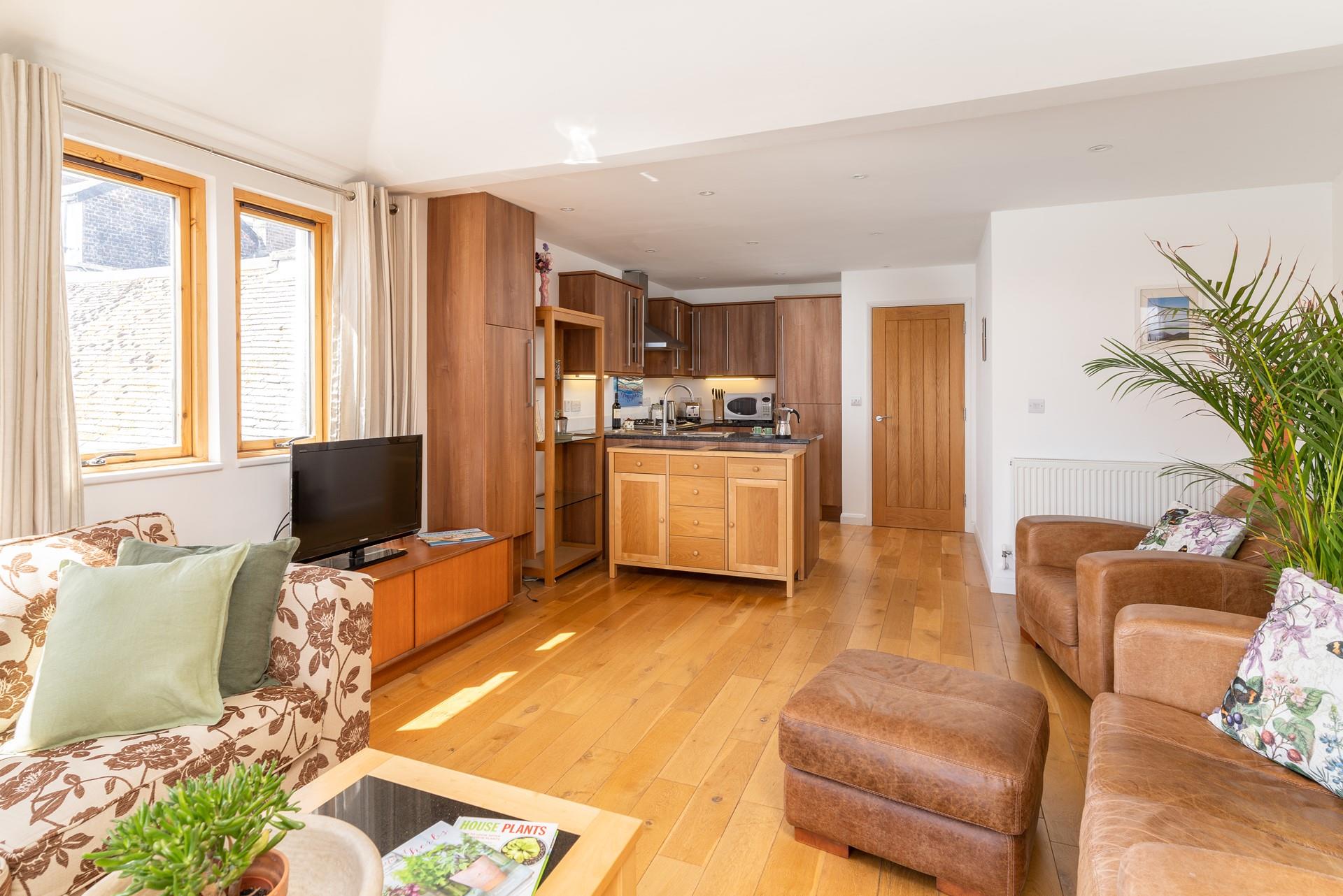 Sink into the leather sofa with wine and nibbles and have a movie night.