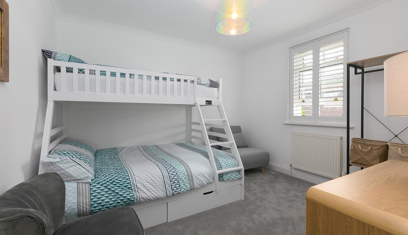 Put the kids to bed and then relax in the living area for the evening with a bottle of wine or two.