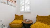 The separate snug room is great for the kids to play in while the adults enjoy some drinks in the living room.