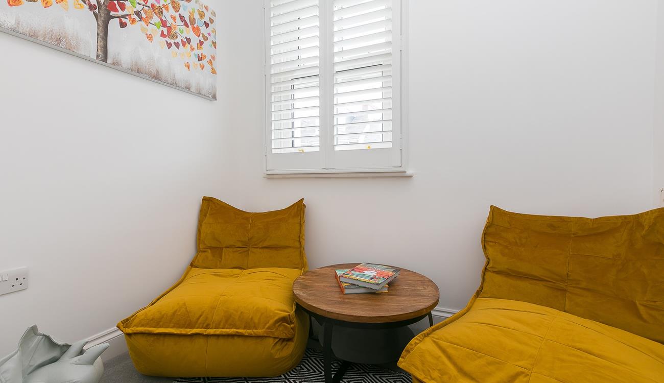 The separate snug room is great for the kids to play in while the adults enjoy some drinks in the living room.