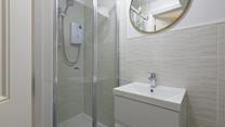 Wash off the sand in a refreshing shower before deciding what to do for dinner.