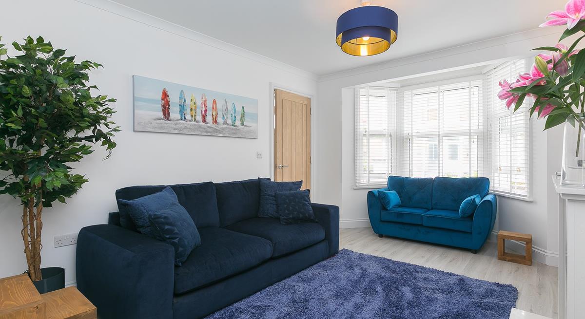 Sit back and unwind in the evenings in your cosy living room.