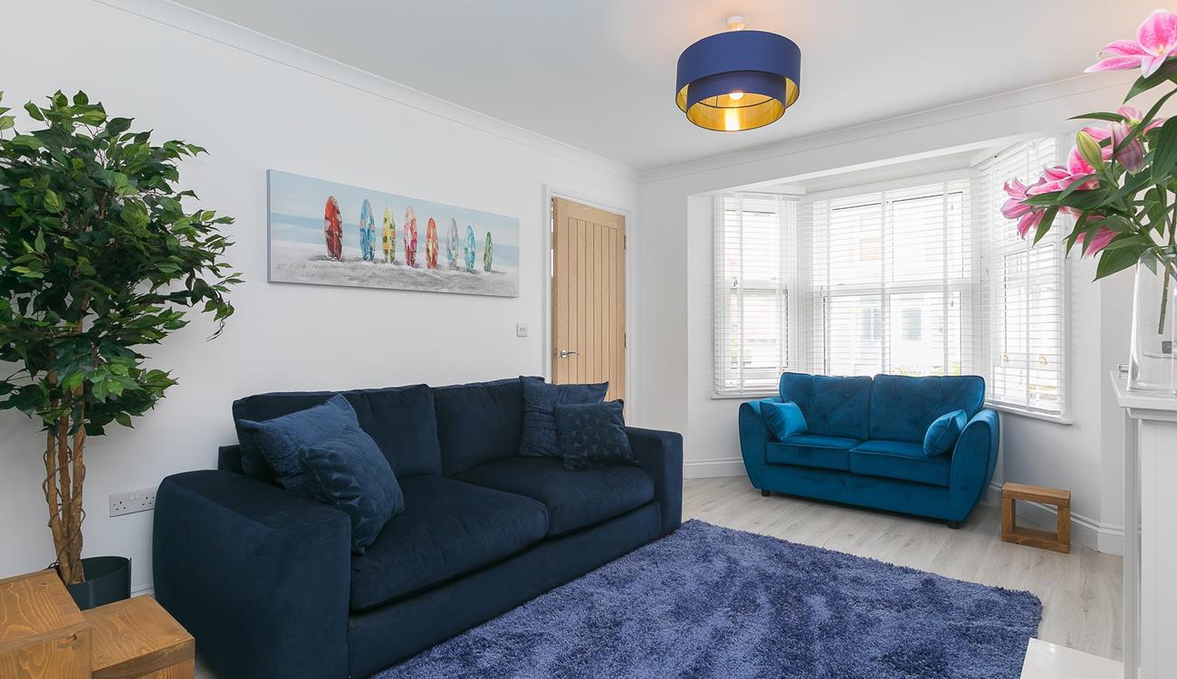 Sit back and unwind in the evenings in your cosy living room.