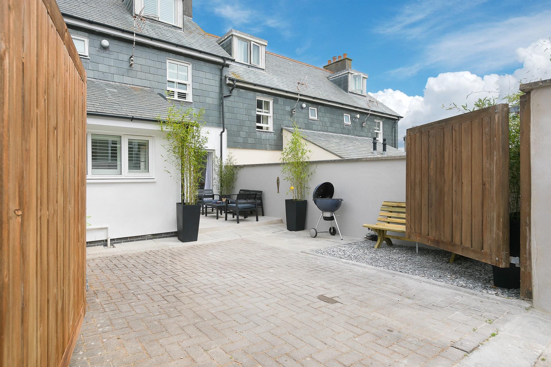 This house offers privacy with the double gates, so you can spend evenings outside soaking up the last of the sun.