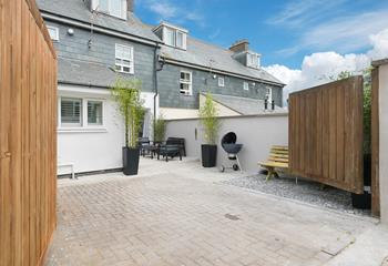 This house offers privacy with the double gates, so you can spend evenings outside soaking up the last of the sun.