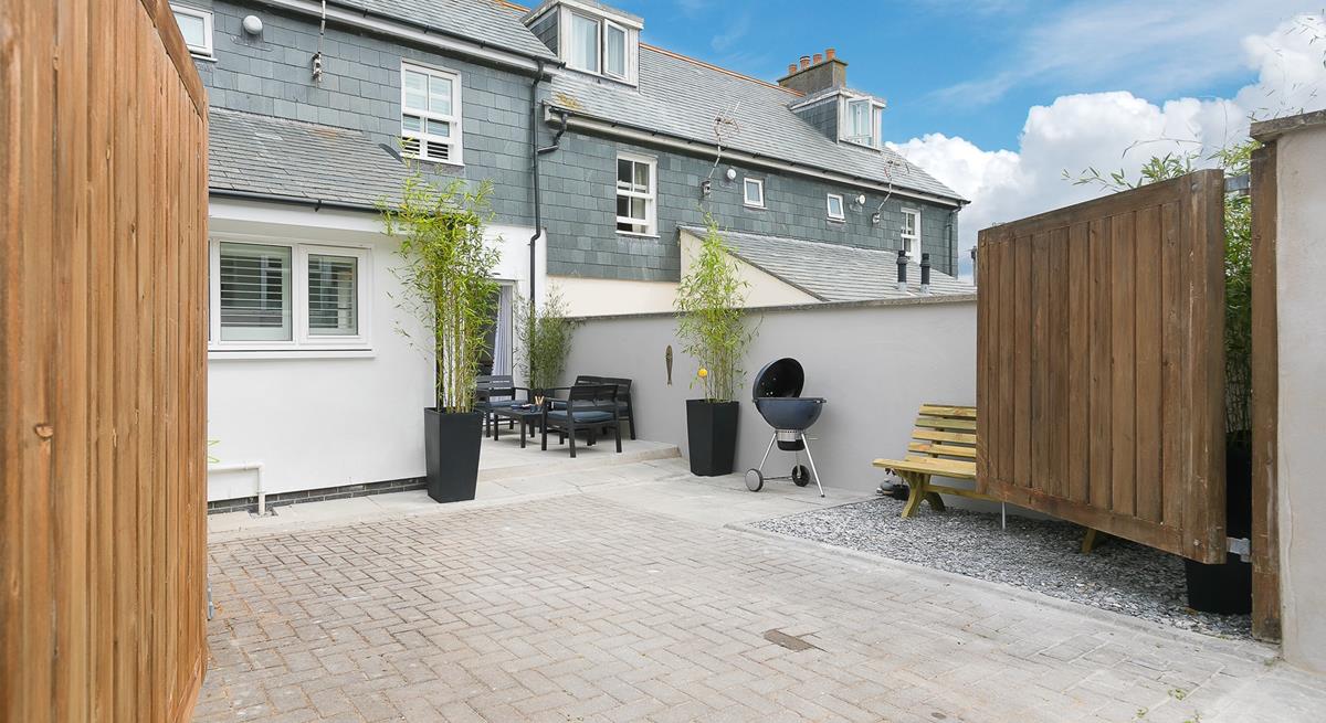 This house offers privacy with the double gates, so you can spend evenings outside soaking up the last of the sun.