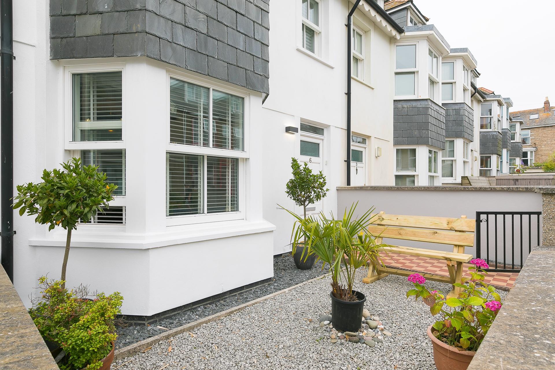 Sip your morning coffee on the bench and decide what's on your day's agenda.