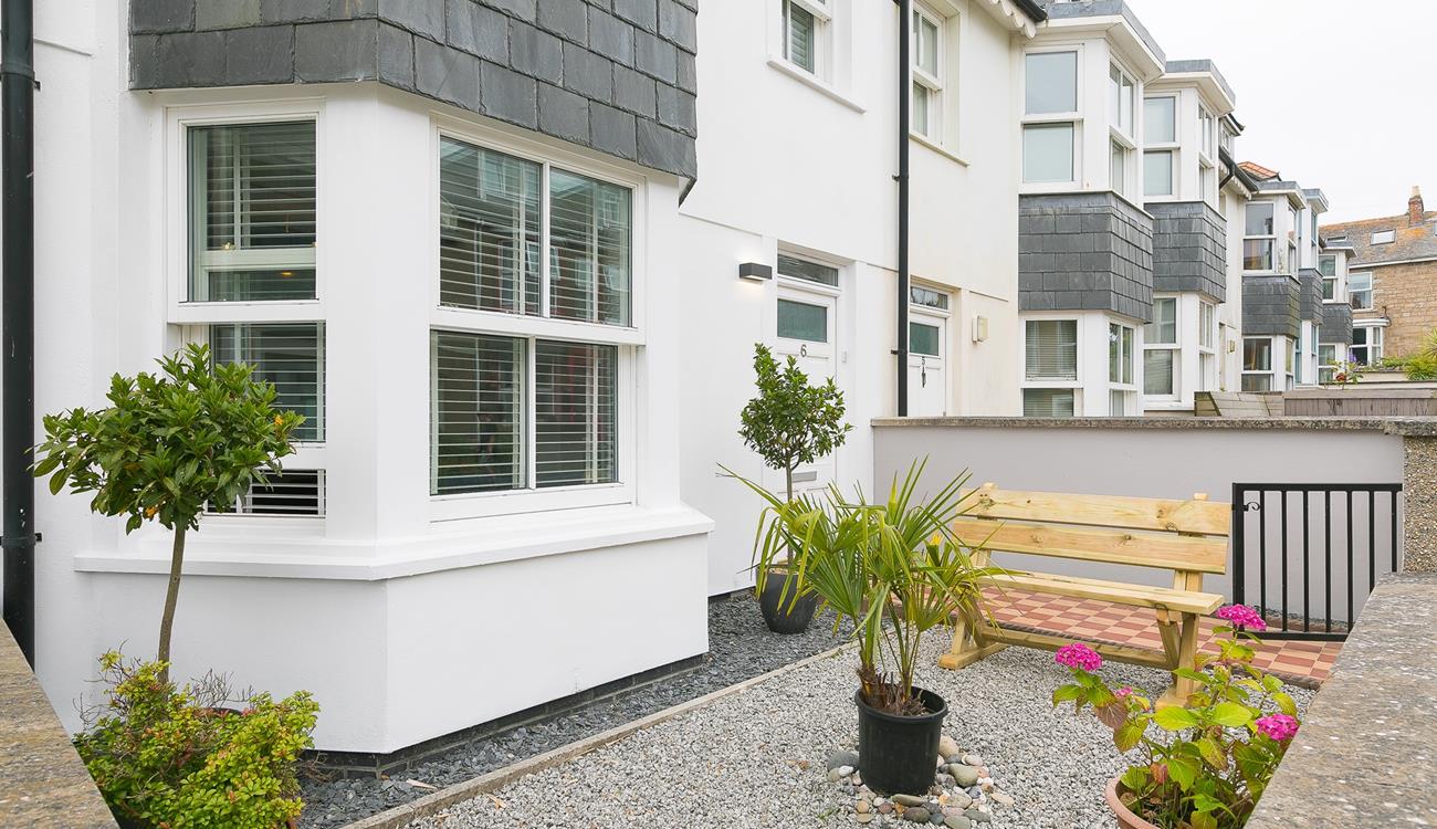 Sip your morning coffee on the bench and decide what's on your day's agenda.