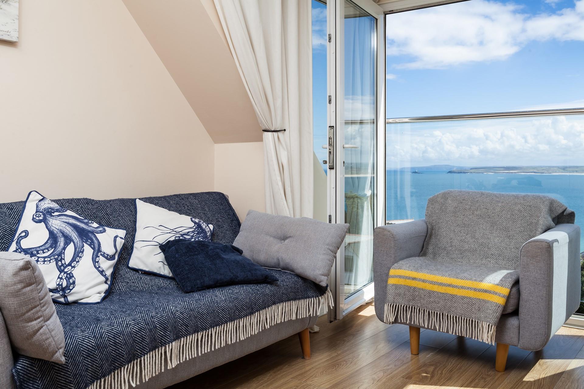 Sit at the balcony and gaze out at uninterrupted sea views across the Bay.
