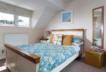 Snuggle into the spacious double bed and drift off to sleep.