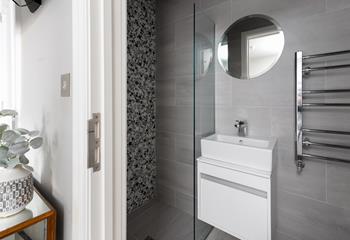 Enjoy one of the three en suite rainfall showers.