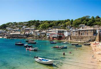 Lamorna is situated with beautiful views of quaint Mousehole Harbour.