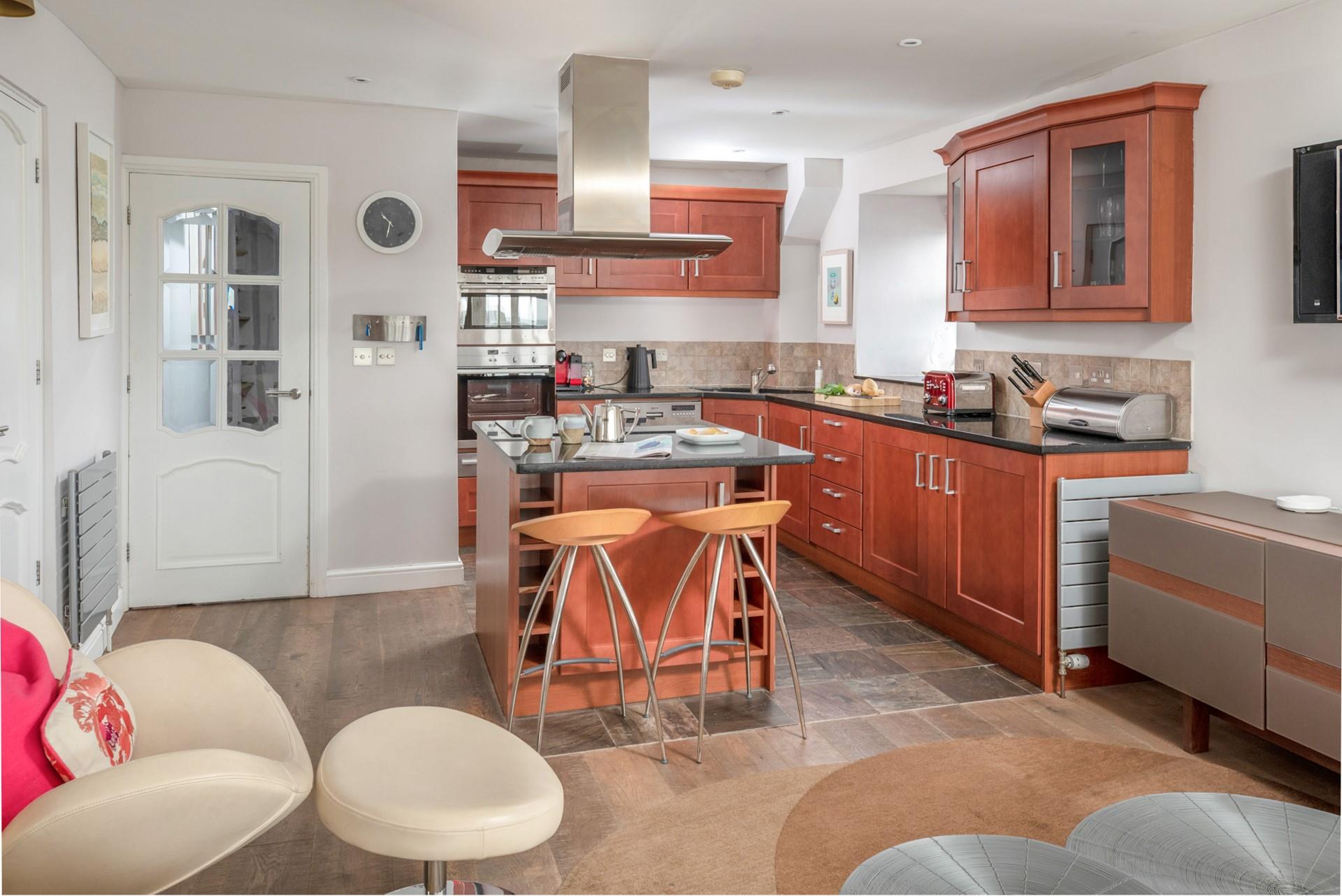 The open plan kitchen/sitting room means you can cook up a storm whilst still spending time together.