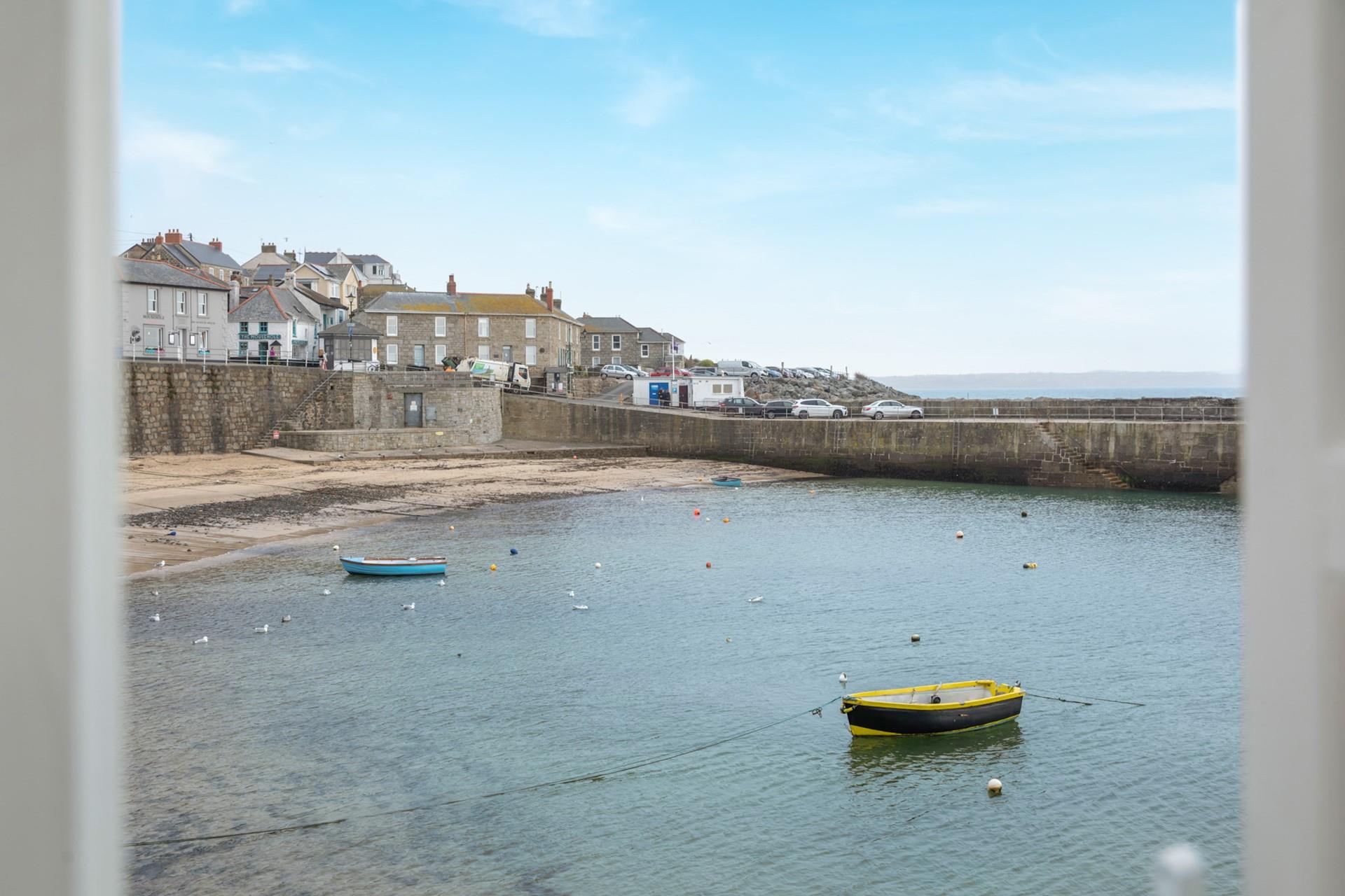 Watch the boats bobbing in the harbour while you sip your morning cuppa.