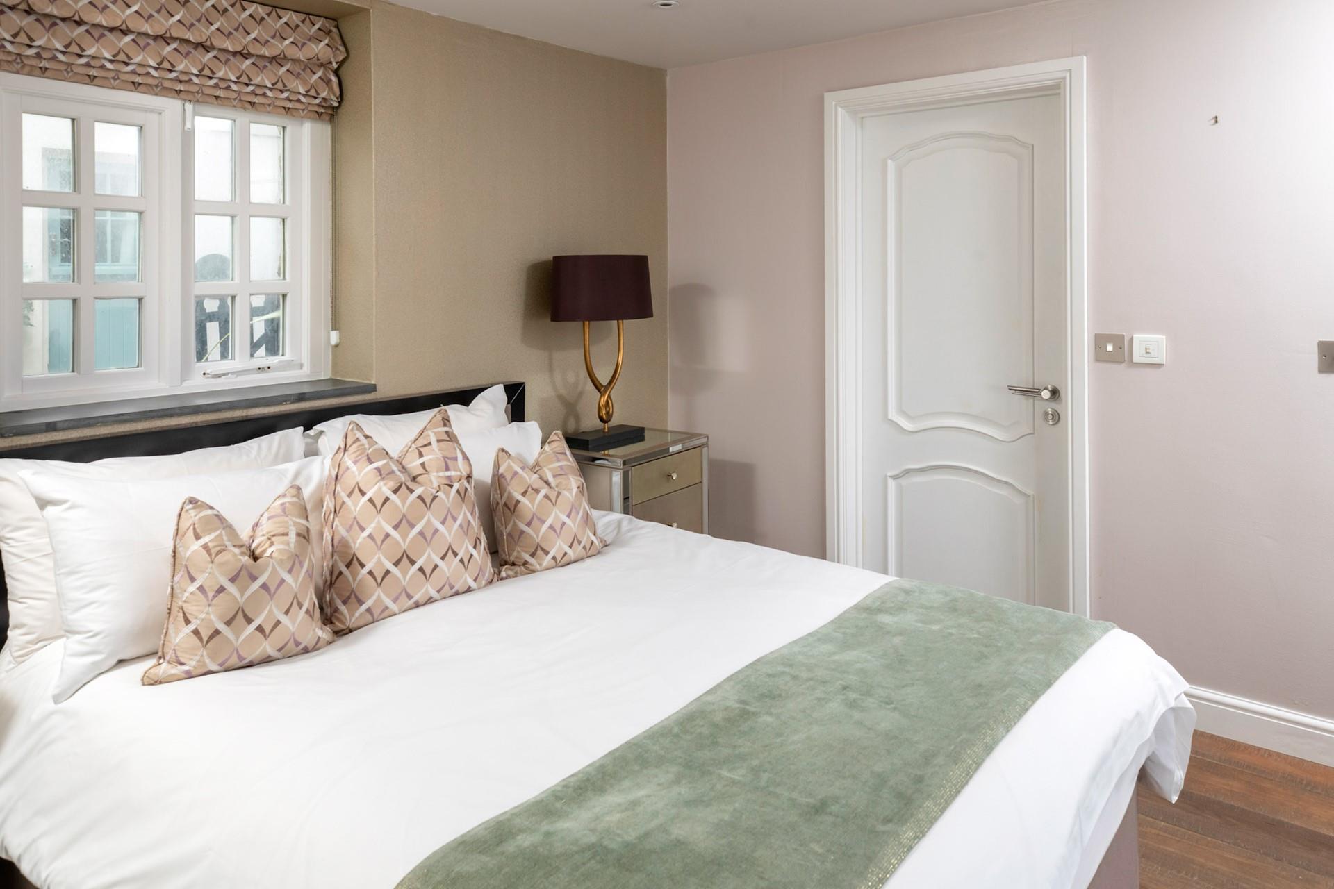 Prepare for the day ahead in the en suite rainfall shower. 