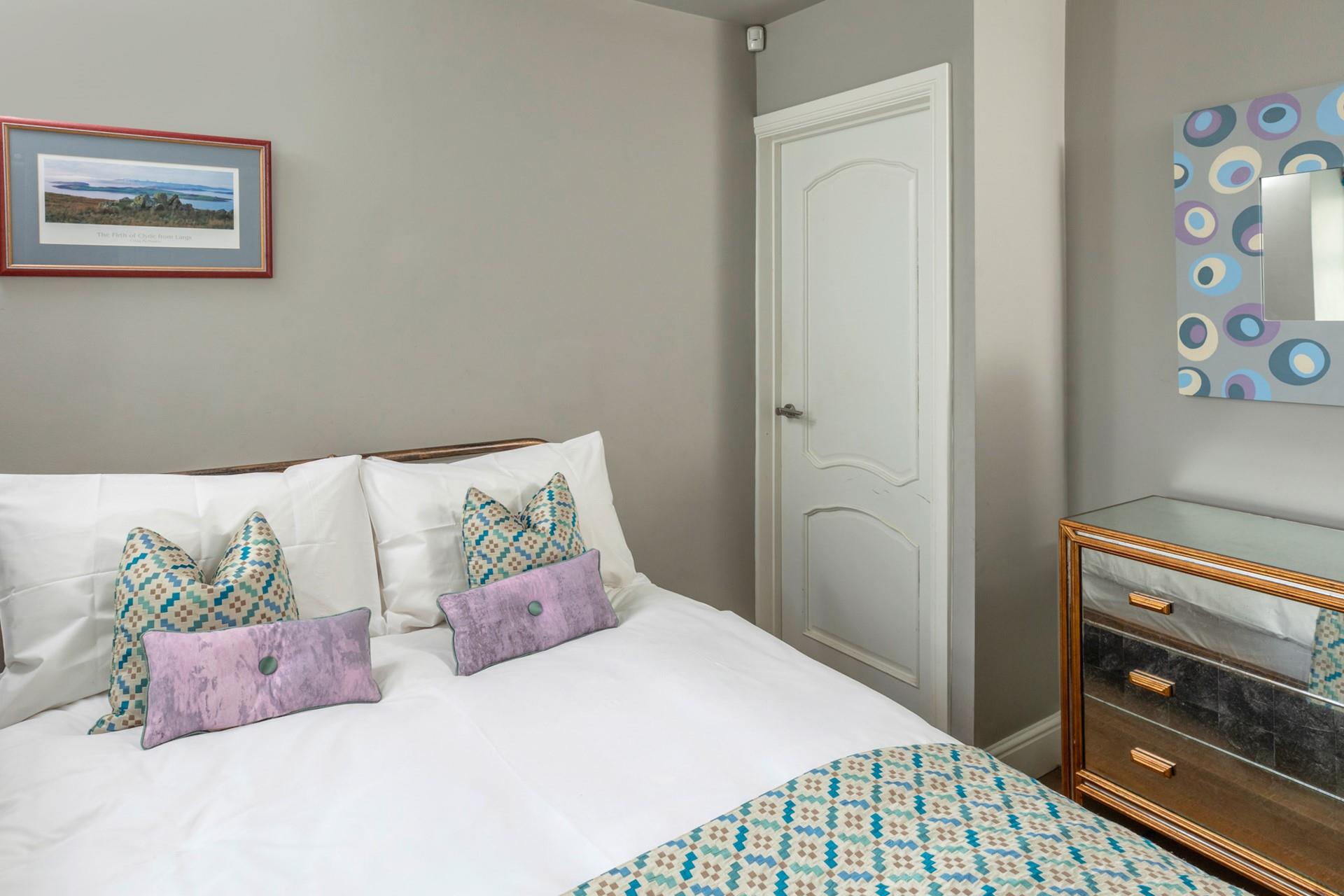 The double bed is a relaxing base to rest each evening.