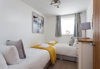 Bedroom 2 has twin beds, perfect for tucking the little ones in exhausted after a day out.