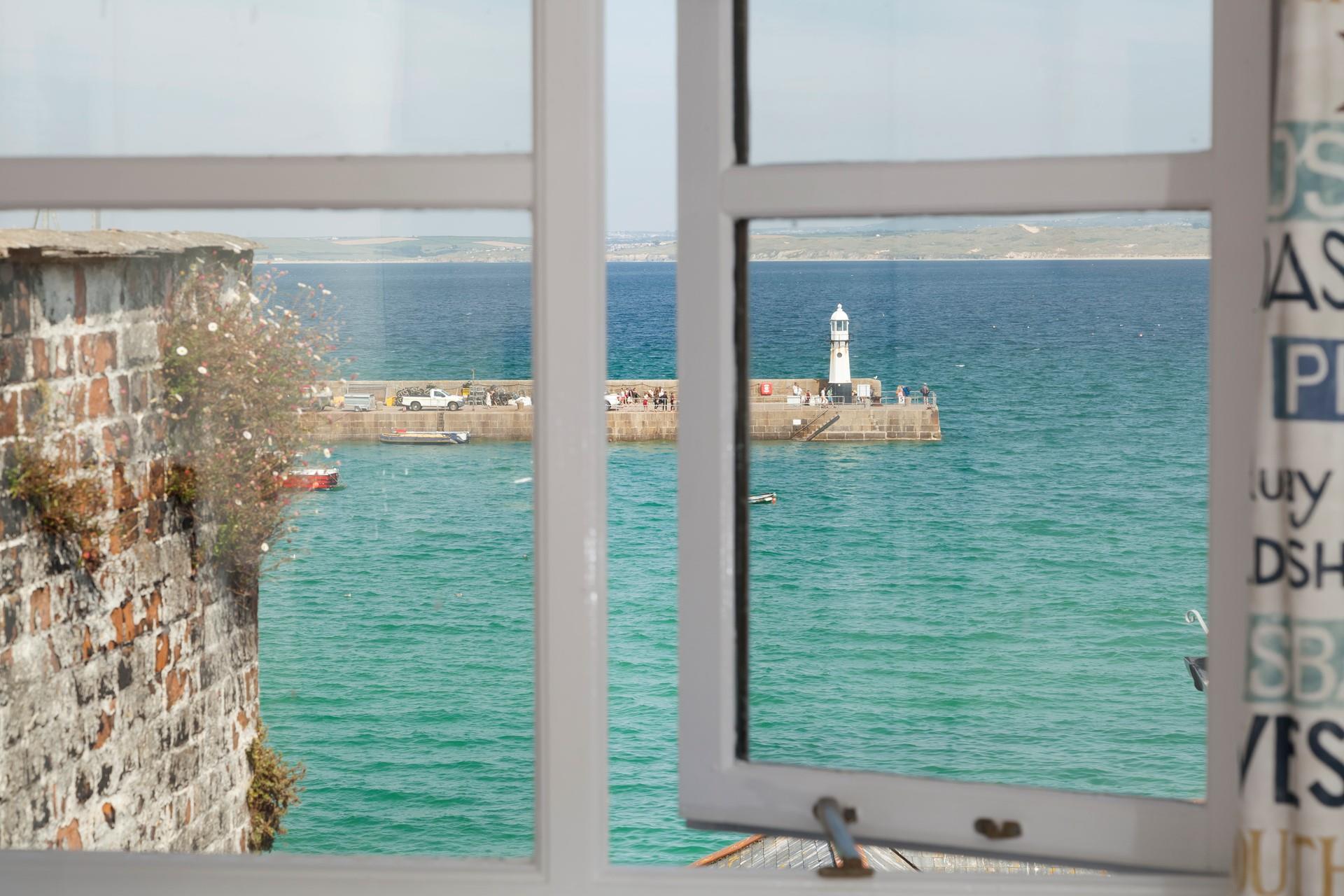Gaze out at the turquoise waters from the comfortable sitting room.