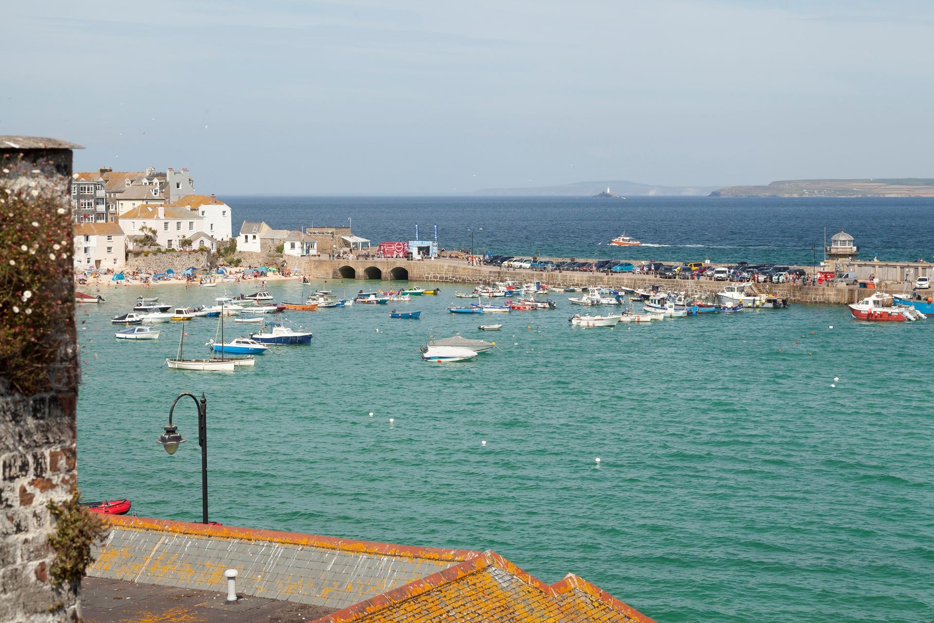 Watch the boats bobbing in the harbour while you sip your morning cuppa.