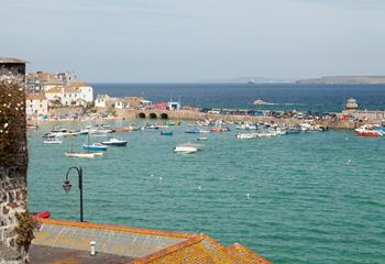 Watch the boats bobbing in the harbour while you sip your morning cuppa.