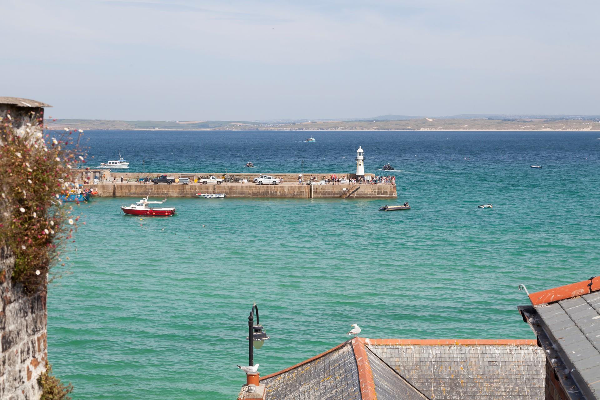 Take a sunny morning swim in the harbour.