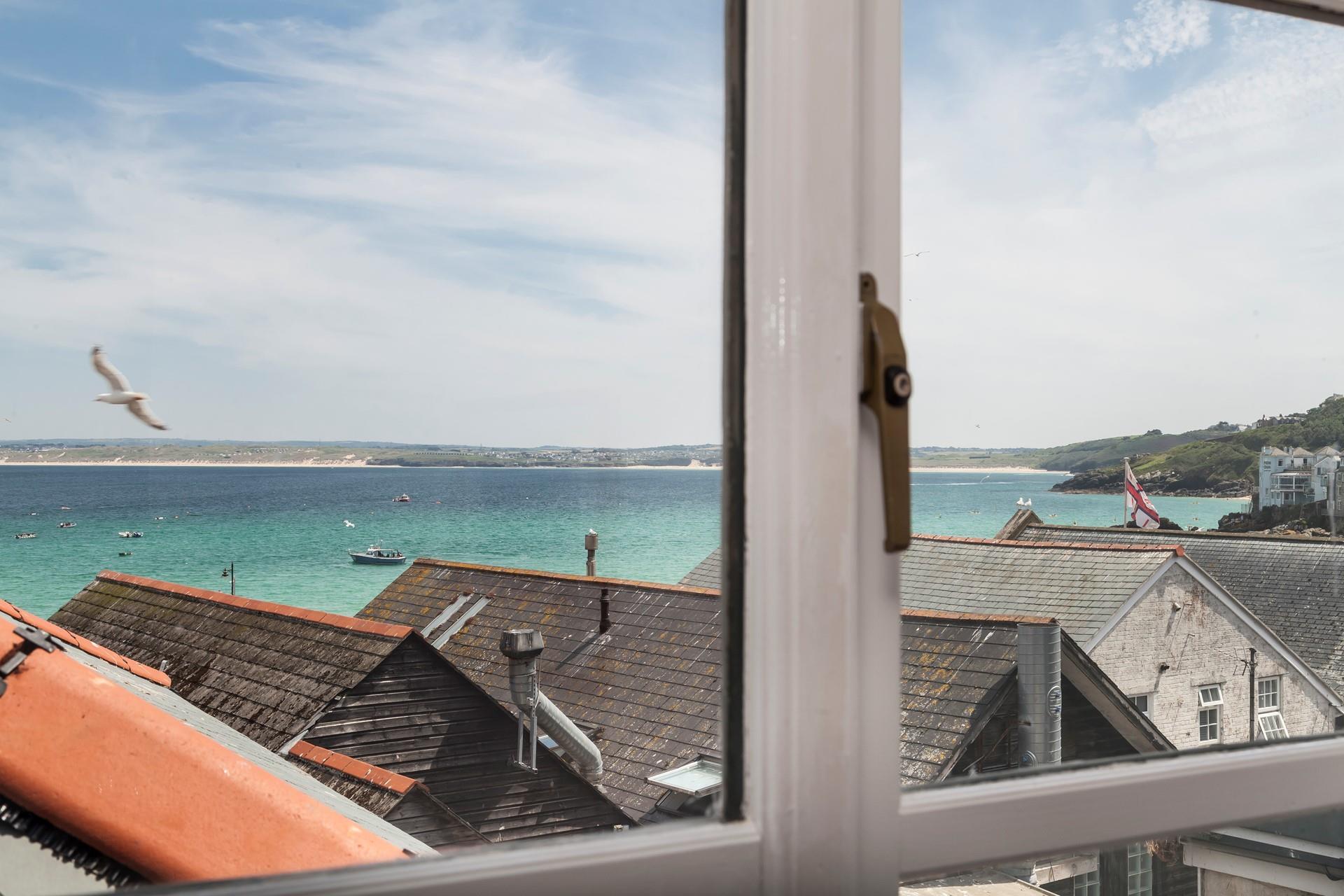 Spend hours staring out at the turquoise waters.